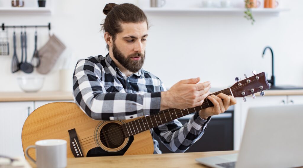 Playing guitar with hand pain