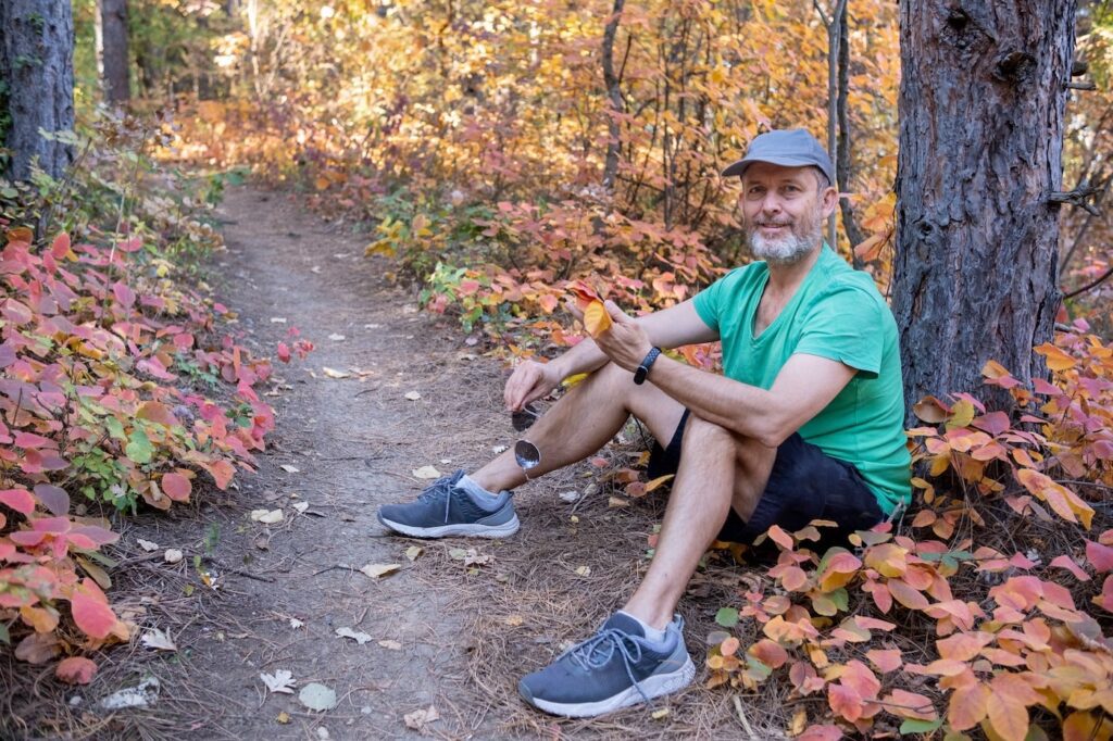 Resting during a hike in the woods