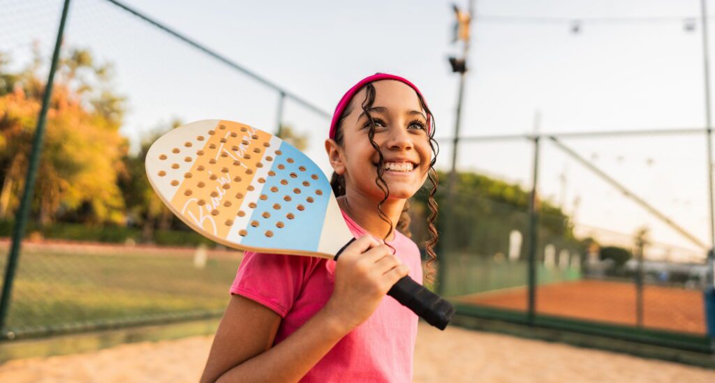 Girl playing pickleball