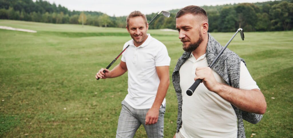 Two Men Playing Golf